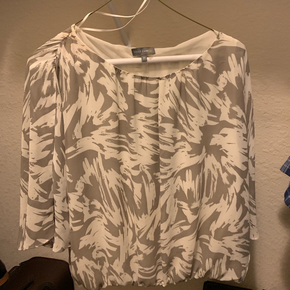 Flutter sleeve , blousy top , easy to wear .